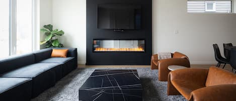 Main Floor Living Room | Fireplace | Smart TV | Netflix | Crave | Prime | Disney + | Sofa | Accent Chairs
