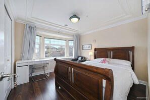 Queen size bed in second floor