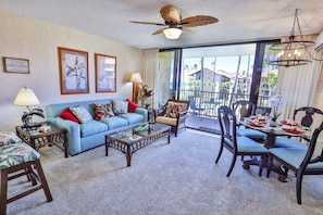 Living / Dining Room with views. Sofa sleeper with a memory foam mattress.