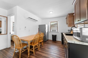 Where gourmet meals meet modern elegance a kitchen and dining space designed for both cooking and sharing memories