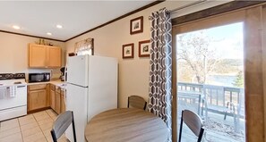Where gourmet meals meet a kitchen and dining space designed for both cooking and sharing memories