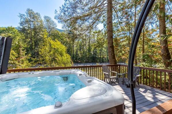 A jetted tub and an umbrella for shade