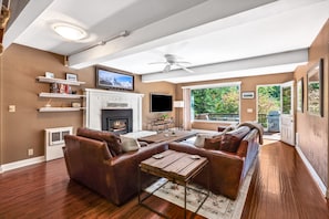 Mid-century modern chic in this riverside sanctuary!