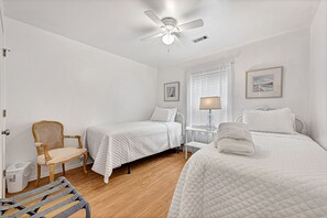 Bedroom with two twin beds and a large closet
