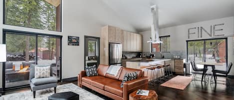 18' ceiling. Heated floors. Leather & wood furniture. Granite chef's kitchen.