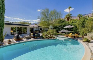 Mid-Mod kidney shaped pool, citrus trees and mountain views!