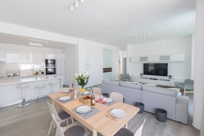 Open-plan ground floor living room, kitchen and dining area