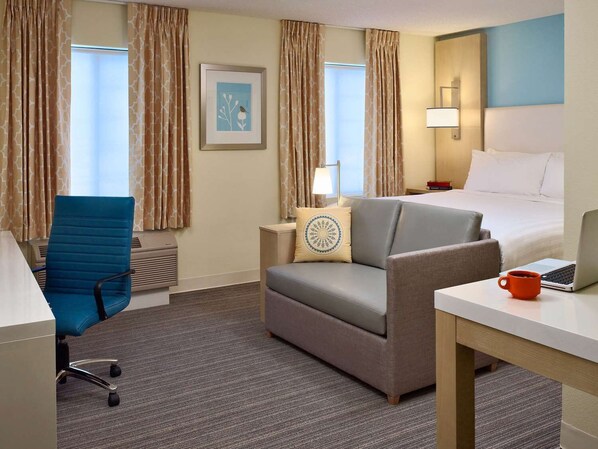Living area. Exact unit will be assigned upon arrival. Views, colors, and decor may vary.