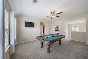 Full-size pool table also included.