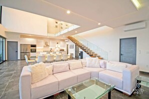 A large comfy sofa in the sitting room