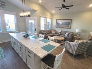 Open living spaces with cathedral ceilings.