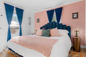 Master Bedroom with romantic nouveau art and lamps.