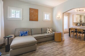 High ceilings and woodwork from last century give this house a historic vibe.