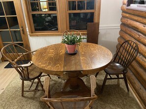 Dining table, expands with two leaves