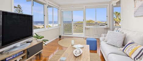 Living room - sun filled, bright & airy with beach views, whilst relaxing.