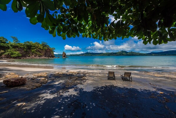 Secluded black sand beach