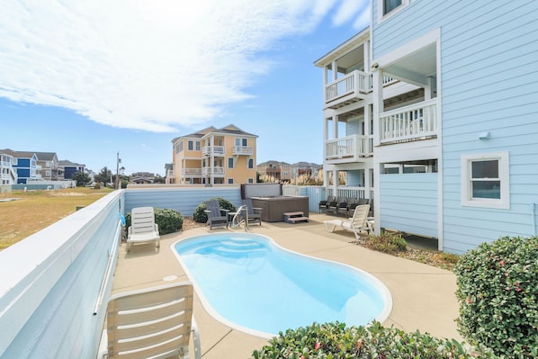 Lounge by the heated pool and hot tub.