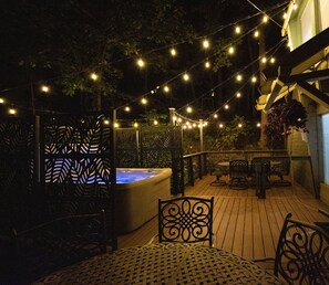 Hot tub 
2 dining seats, each sits 6