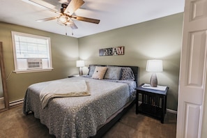 Master Bedroom. King Size memory foam bed. Smart TV. His & Her Closets!