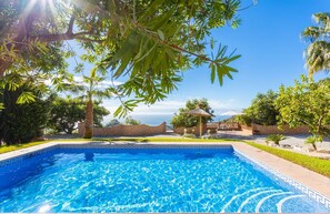 Private pool, terrace, and garden with sea views