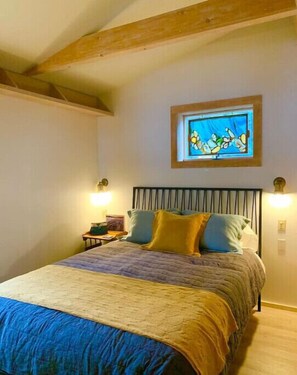 Main level queen bedroom with lake views
