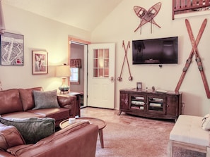 Main floor features 2 bedrooms, bathroom and 2 twin beds located upstairs.
