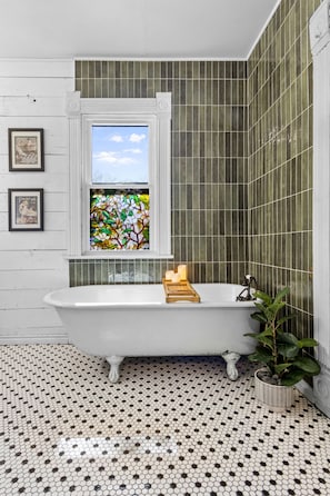 Soak in the antique clawfoot tub that is original to the home.