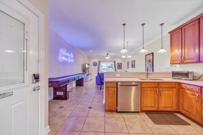 The open floor plan allows everyone to gather, cook, play games or relax.