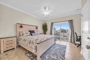1st floor primary w/ king bed w/ensuite bath, private balcony and workspace.