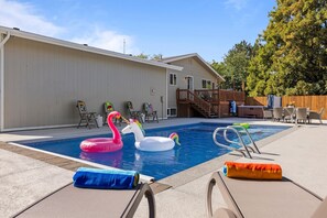 Large heated pool, back deck and hot tub