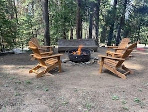 Outdoor firepit and sitting area.