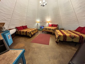 Three queen beds in your private Tipi!