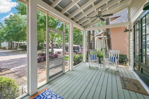 Screened in Patio with two rocking chairs