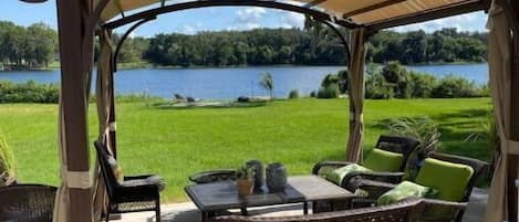 back deck - love seat and chairs -fire pit and dinning table 