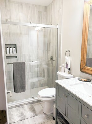 Newly renovated bathroom with rain shower