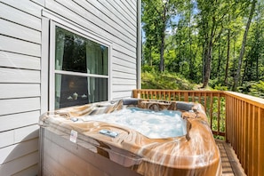 Soak under the stars! A private hot tub with mountain views is the perfect way to end the day. #HotTubViews #MountainEscape - The Loop - Gatlinburg, TN