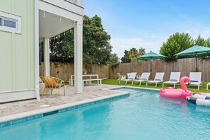 Your private oasis—heated pool, comfy loungers, and endless sunshine. - The Seafoam - Panama City Beach, FL
