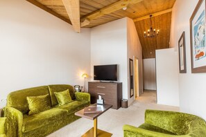 Sink into the cozy sofa after a day exploring the area.