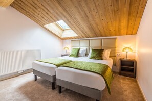 Get a good night's rest in the cozy bedroom.