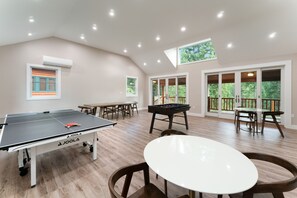 Main Level Game Room with Ping Pong and Foosball