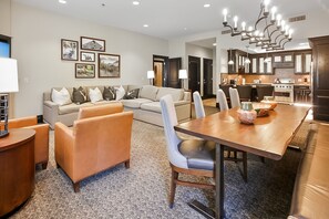 Inside unit dining room, living room, looking into kitchen