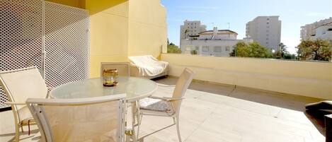 Large and sunny terrace with outdoor dining area and extra outdoor seating