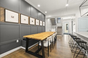 StayRepublic | Living Room w/ Smart TV (Plenty of Seating!) Open to Kitchen, Dining & Half Bathroom.
