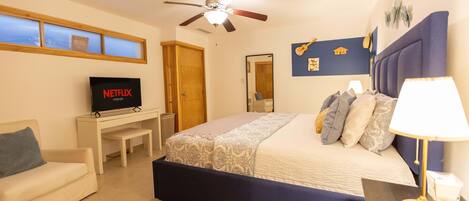 Main room has a King size bed, smart tv, a/c, ceiling fan, private bathroom, closet.