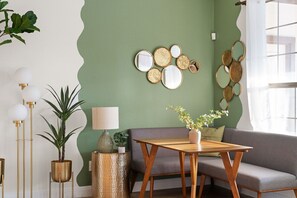A comfortable seating area with a table - perfect for catching up with friends or family.