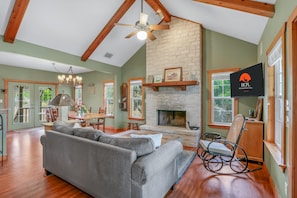 Embrace the comfort of the home, in front of the wood burning fireplace