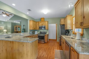 Fully stocked kitchen with ample cooking space