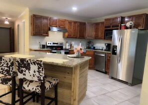 Large Fridge/freezer and glass top Stove