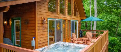Ultimate Treehouse boasts a hot tub, fireplace and outdoor fire pit