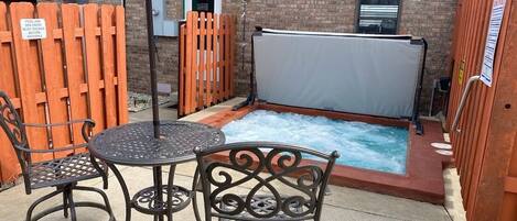 Outdoor in-ground heated hot tub seats 8 adults comfortably; CLOSED in Jan & Feb